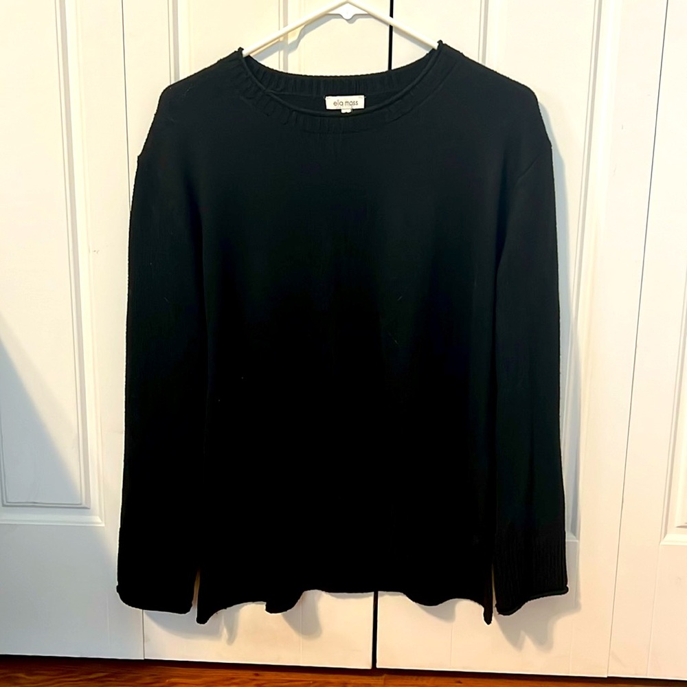 Black thin sweater with slight high low hem.